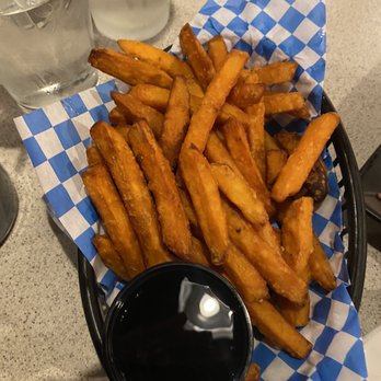 Urban Grille - a basket of french fries with a side of ketchup - Pubs Near Me - Logan, Ohio