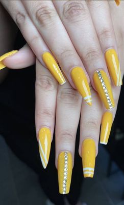 Acrylic Mastery - We specialize in expertly sculpted acrylics, custom-designed for lasting beauty. From dramatic lengths to refined square or almond tips, our team ensures every set fits your style and daily needs. Explore examples of our classic nudes, bold colors, and innovative acrylic blends. Call us today or Walk-Ins welcome!
