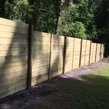 Apex Fence Builders - The longer view of the back fence - Fences & Gates Near Me