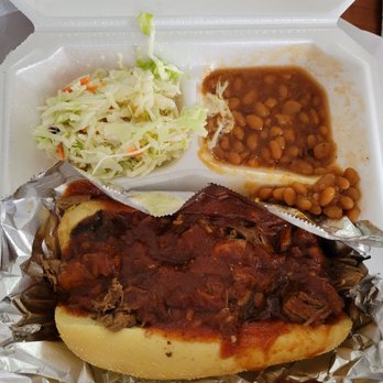 Smokehouse BBQ - Expensive Coleslaw, Expensive beans, and a soaked in BBQ sauce Brisket sandwich - Barbeque Near Me - Anchorage, Alaska