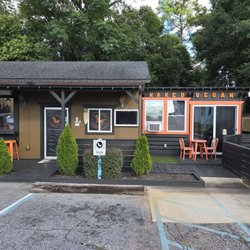 Naked Vegan - Entrance. It is behind  a Barber Shop. If you are not familiar with the area, you may miss it and miss out on a great meal.