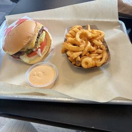 Single Cheeseburger and Curly Fries Single Cheeseburger and Curly Fries