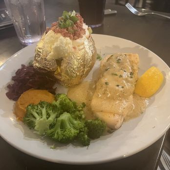 Cody Steak House - Halibut with deviled crab, veggies, loaded potato. - Steakhouses Near Me - Cody, Wyoming Cody Steak House - Halibut with deviled crab, veggies, loaded potato. - Steakhouses Near Me - Cody, Wyoming