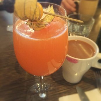Le Passé Composé - Orange Grapefruit mimosa and coffee on the side. - Breakfast & Brunch Near Me - Montreal, Quebec Le Passé Composé - Orange Grapefruit mimosa and coffee on the side. - Breakfast & Brunch Near Me - Montreal, Quebec