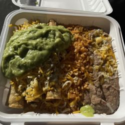 El Ranchero's - 3 rolled tacos with rice and beans