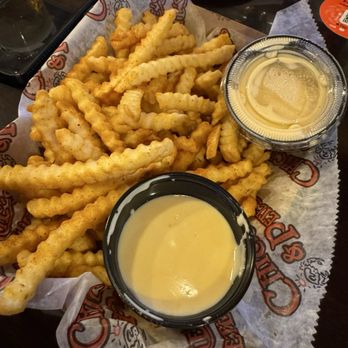 Chickie’s and Pete’s - Fries with cheese sauce - Sports Bars Near Me - Philadelphia, Pennsylvania