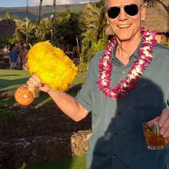 Globe Getaways - Making music at Old Lahaina luau. - Travel Services Near Me - Lakewood, Colorado