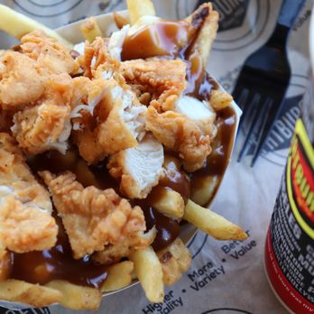Fatburger - a bowl of fries and a drink - Burgers Near Me - Winnipeg, Manitoba