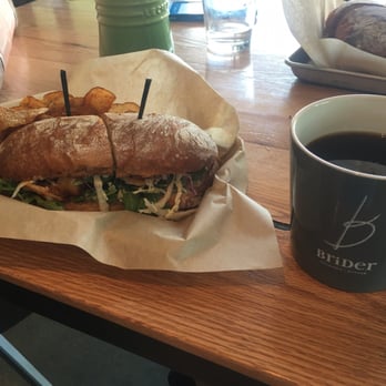Brider - Cajun Shrimp sandwich with a cup of coffee. - New American Near Me - Denver, Colorado Brider - Cajun Shrimp sandwich with a cup of coffee. - New American Near Me - Denver, Colorado