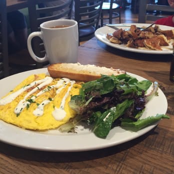 First Watch - The smoked salmon and roasted vegetable frittata and a kid's chocolate chip pancake in the back. Every bit of it was delicious! - Breakfast & Brunch Near Me - Smyrna, Tennessee First Watch - The smoked salmon and roasted vegetable frittata and a kid's chocolate chip pancake in the back. Every bit of it was delicious! - Breakfast & Brunch Near Me - Smyrna, Tennessee
