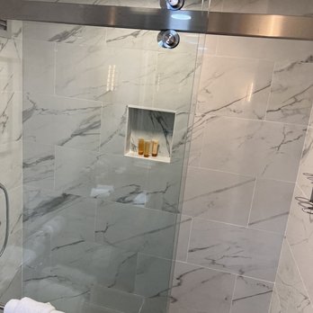 The Henry, Autograph Collection - Marble shower - Hotels Near Me - Dearborn, Michigan The Henry, Autograph Collection - Marble shower - Hotels Near Me - Dearborn, Michigan