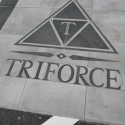 Triforce Tinseltown Plaza - Sidewalk logo