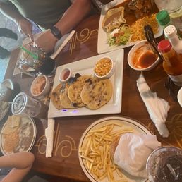Kid's cheeseburger, kid's quesadilla, Asada burrito, steak picado.papusa. Kid's cheeseburger, kid's quesadilla, Asada burrito, steak picado.papusa.