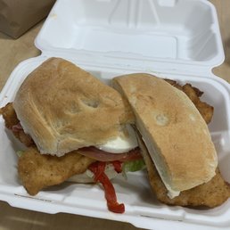 a sandwich in a styrofoam container a sandwich in a styrofoam container