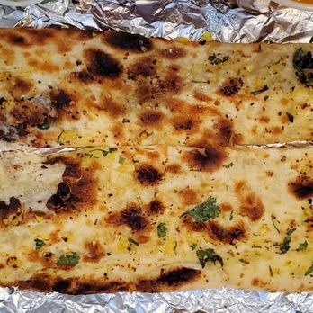 Ocean Indian Cuisine - Garlic Naan ($3.95) - Indian Near Me - San Francisco, California Ocean Indian Cuisine - Garlic Naan ($3.95) - Indian Near Me - San Francisco, California