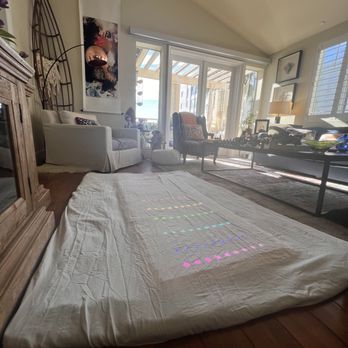 inTouch with Nadine - The rainbow PEMF mat at a clients home.. adds to next level relaxation! - Yoga Near Me