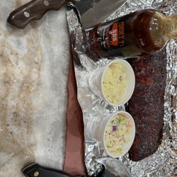 Competition BBQ sauce, potato  salad, coleslaw and of course only knives  to use to cut this deliciousness.