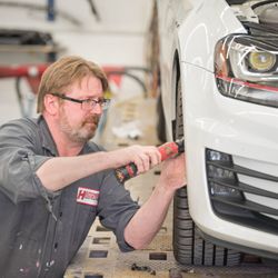 Heppner's Auto Body - Putting a bumper back on