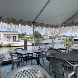 White Cap Fish Market - Outdoor seating by the marina