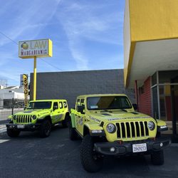 The Margarian Law Firm - Billboard and our Lemon Law Refund Squad Jeeps!