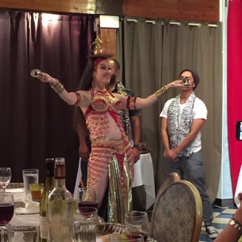 Abigail's Moroccan Cuisine - Belly dancer. She balanced a sword on her head earlier. - Moroccan Near Me - Alameda, California Abigail's Moroccan Cuisine - Belly dancer. She balanced a sword on her head earlier. - Moroccan Near Me - Alameda, California