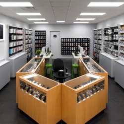 A To Z Unlimited Wireless - Clean, organized showroom featuring phone accessories, device sales, and professional repair services performed by experienced technicians.