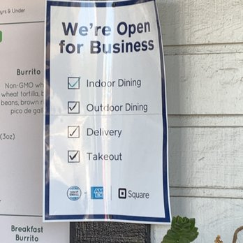 Oasis Vegetarian Cafe - Signage saying types of dining options available - Vegetarian Near Me - Riverside, California
