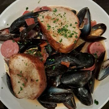 Anthony Jacks Wood Fired Grill - Mussels with hot dog (suppose to be chorizo ) - Salad Near Me - Southington, Connecticut Anthony Jacks Wood Fired Grill - Mussels with hot dog (suppose to be chorizo ) - Salad Near Me - Southington, Connecticut