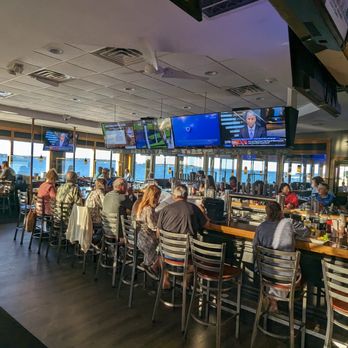 Tides Restaurant & Pub - people sitting at the bar - Seafood Near Me - Nahant, Massachusetts Tides Restaurant & Pub - people sitting at the bar - Seafood Near Me - Nahant, Massachusetts