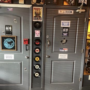 Ate Track - The restroom doors!  Check out the funny political statements on the entry doors to each restroom  I used the door on the right - New American Near Me - Cartersville, Georgia