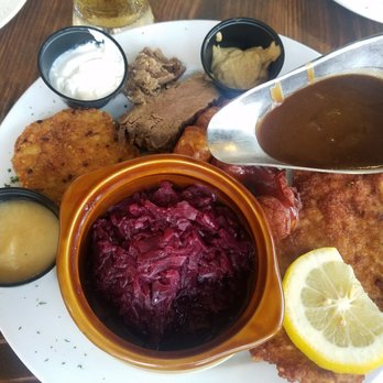 Checkers Old Munchen - Bavarian platter with a side of cabbage and potato pancake - American Near Me - Pompano Beach, Florida Checkers Old Munchen - Bavarian platter with a side of cabbage and potato pancake - American Near Me - Pompano Beach, Florida