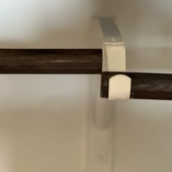 Monticello Homes - A 112 inch long wooden rod for hanging clothes in the master bedroom closet. WHY cut it into two pieces?