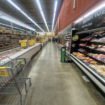 Food4Less - a grocery store aisle with grocery carts - Grocery Near Me - Santee, California