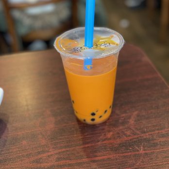 Com Ga Ninh Kieu - a plastic cup of bubble tea with a blue straw - Vietnamese Near Me - Atlantic City, New Jersey Com Ga Ninh Kieu - a plastic cup of bubble tea with a blue straw - Vietnamese Near Me - Atlantic City, New Jersey