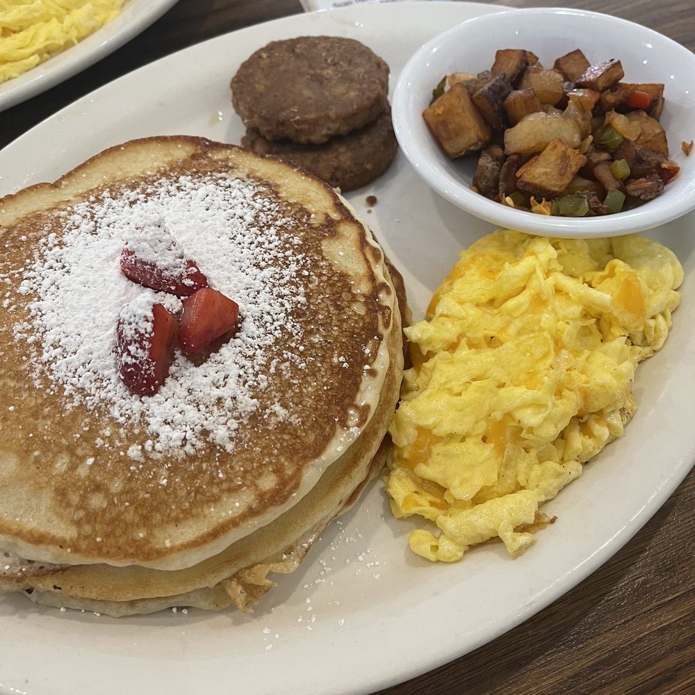 Rosie's Coffee Cafe - Specialty Pancake Platter with veggie sausage, scrambled eggs with cheese and home style potatoes - Breakfast & Brunch Near Me - Atlanta, Georgia Rosie's Coffee Cafe - Specialty Pancake Platter with veggie sausage, scrambled eggs with cheese and home style potatoes - Breakfast & Brunch Near Me - Atlanta, Georgia