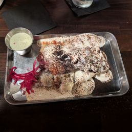 YUCCAS ANIMALES  Smoked lamb, processed cheese, chlorophyll aioli, pickled onion and chili
