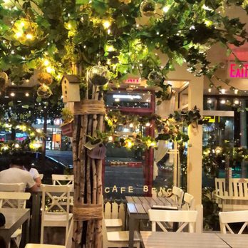 Cafe Bench - They change this tree seasonally - Cafes Near Me - Flushing, New York