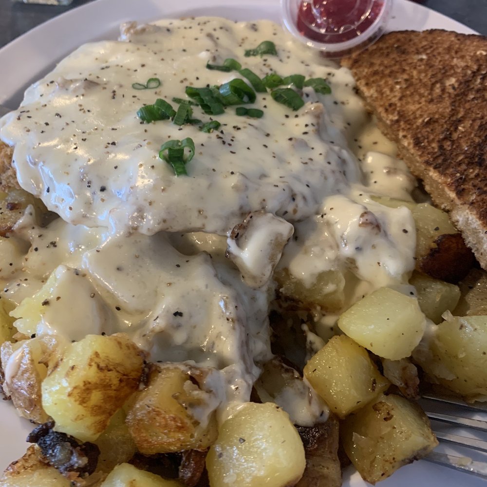Chicken Fried steak. Also that homemade jam was insane. Chicken Fried steak. Also that homemade jam was insane.