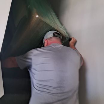Haul-4-U - Maneuvering A Couch Down 2 Flights Of Stairs. - Movers Near Me