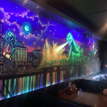Space Room Lounge - a view of a city at night - Lounges Near Me - Portland, Oregon Space Room Lounge - a view of a city at night - Lounges Near Me - Portland, Oregon