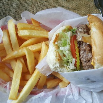 Dale's Essenhaus - Perfectly cooked hand formed 1/2 pound patty on a locally sourced sourdough bun. Juicy and delicious! - Burgers Near Me - Georgetown, Texas