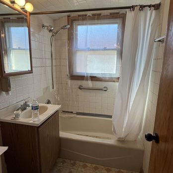 Geiger’s Remodeling - Peeling floor tile, missing shower tiles, old toilet & cabinetry, outdated vanity - General Contractors Near Me - Northlake, Illinois Geiger’s Remodeling - Peeling floor tile, missing shower tiles, old toilet & cabinetry, outdated vanity - General Contractors Near Me - Northlake, Illinois