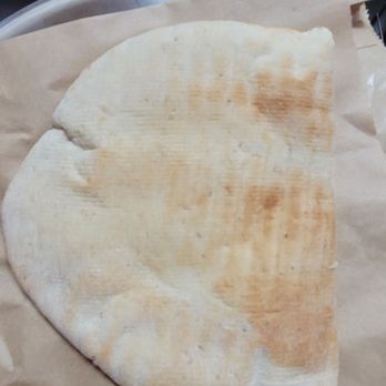 Mezeh - Soft fladbread half served with the bowl - April 2024 - Mediterranean Near Me - Silver Spring, Maryland Mezeh - Soft fladbread half served with the bowl - April 2024 - Mediterranean Near Me - Silver Spring, Maryland