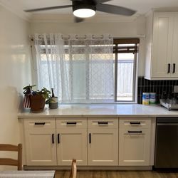 Lavera Home Repair Services - Additional cabinets and quartz counters in kitchen