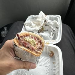 Poppies Deli - Hot Pastrami on a long roll with LT&Fried Onions