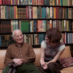 TheKey - Formerly Home Care Assistance - Meet Joe. One of our amazing clients who shares his love of books with his caregiver.