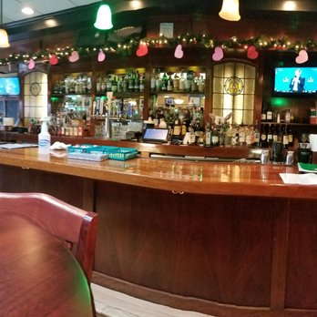 McBride's Pub - Full bar, beers on tap and bottle, TV's all around. Bar side seating removed during Covid limitations. - Irish Pub Near Me - Providence, Rhode Island