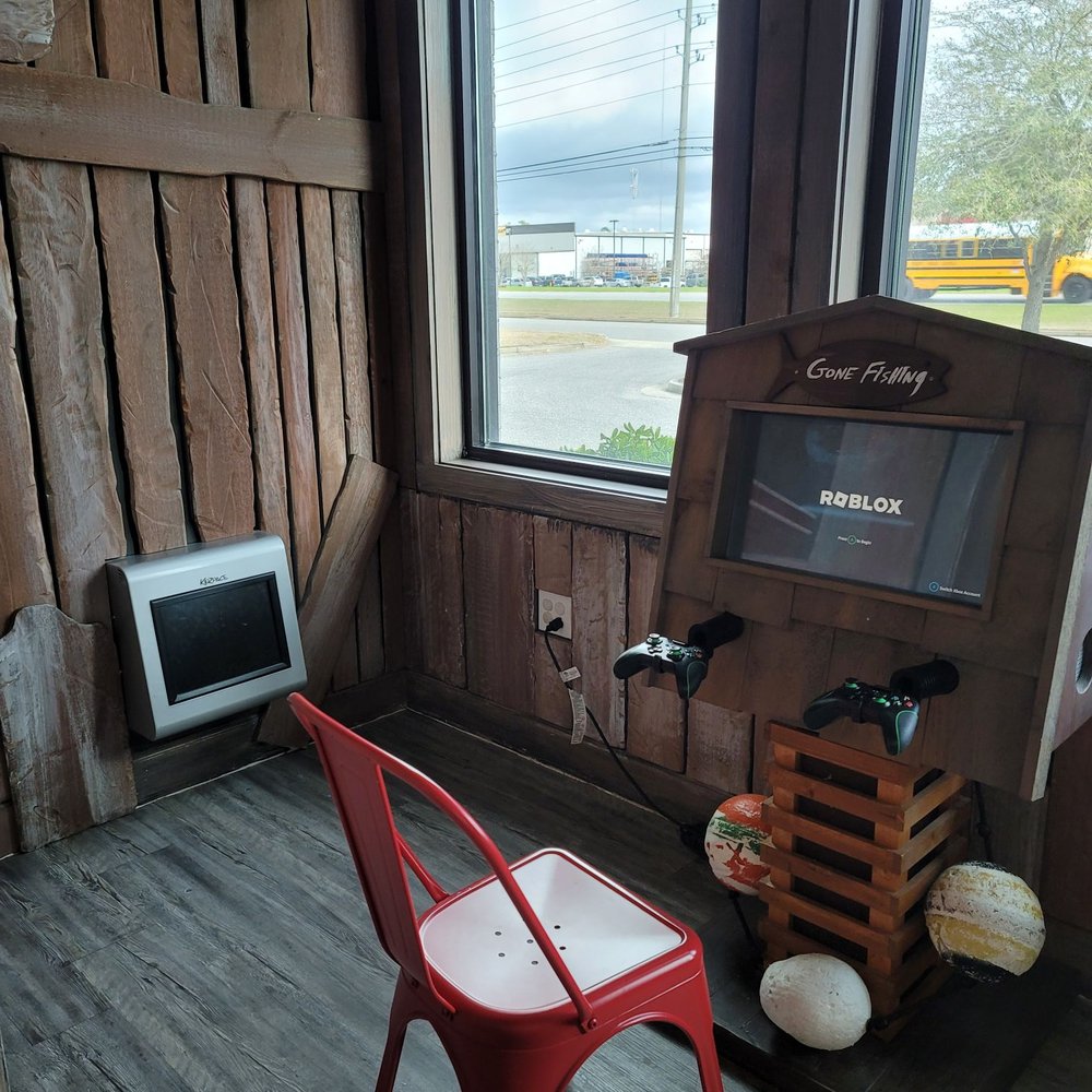 Malbis Parkway Pediatric Dentistry - Video game area - Pediatric Dentists Near Me - Daphne, Alabama Malbis Parkway Pediatric Dentistry - Video game area - Pediatric Dentists Near Me - Daphne, Alabama