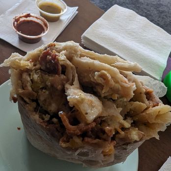 Pepe's - Bacon breakfast burrito with green chille pork salsa. Hard to get a flattering picture of a burrito, but it was excellent! - Mexican Near Me - Fullerton, California Pepe's - Bacon breakfast burrito with green chille pork salsa. Hard to get a flattering picture of a burrito, but it was excellent! - Mexican Near Me - Fullerton, California