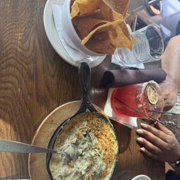 Homemade chips and mustard green artichoke dip Homemade chips and mustard green artichoke dip